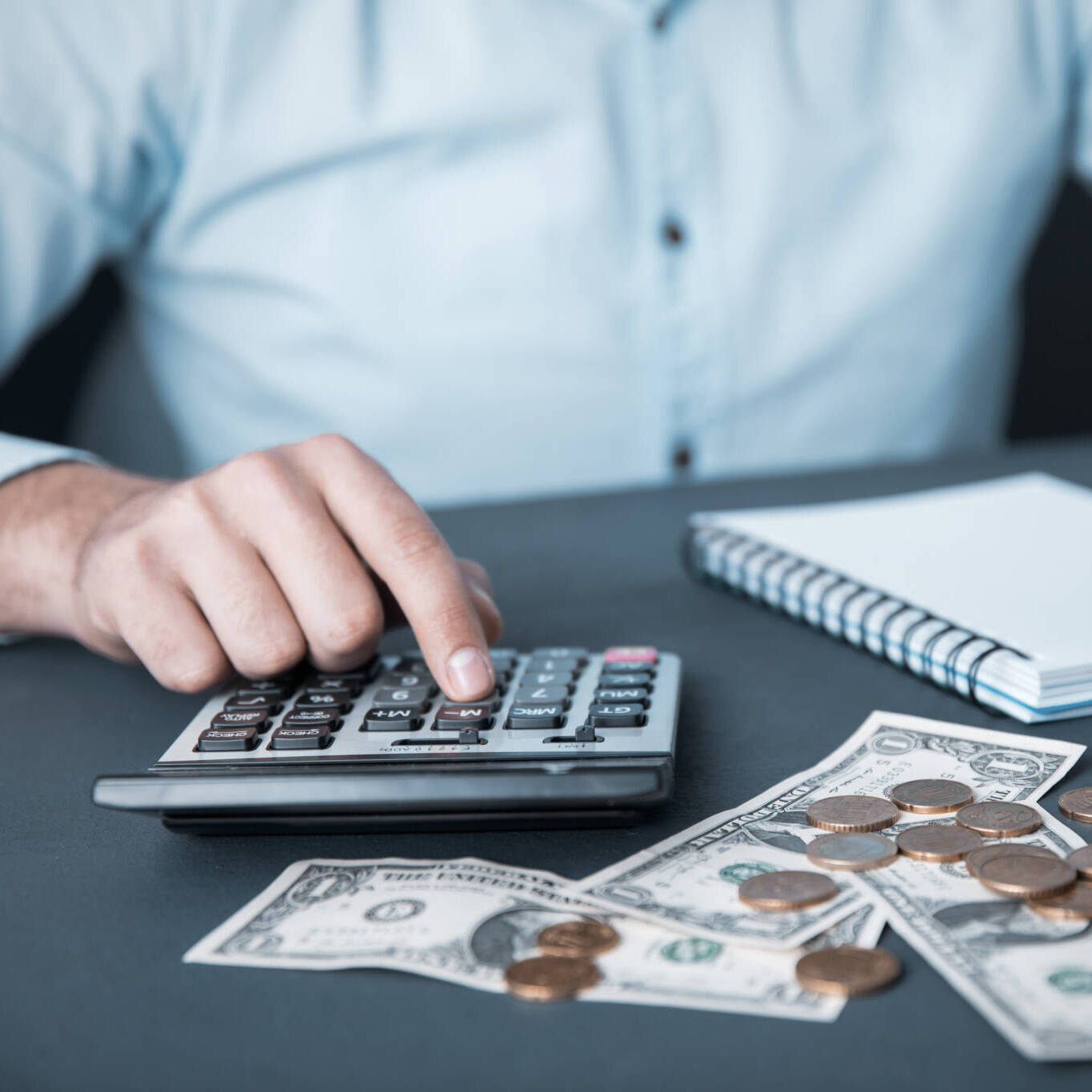 Man Hand Money With Calculator And Notepad Man Hand Money With Calculator And Notepad